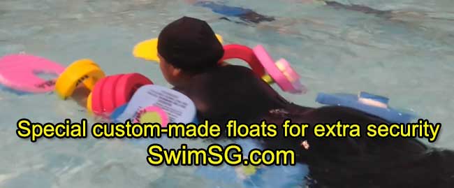 SwimSG.com - Swimming classes adults senior with special floats singapore